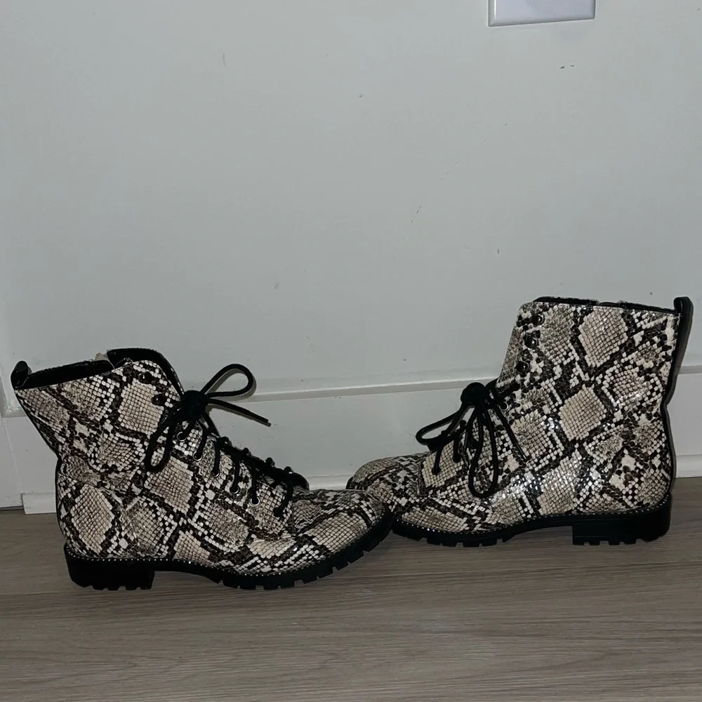 Express snakeskin combat booties. Rhinestone embellishing around sole. - Picture 7 of 10